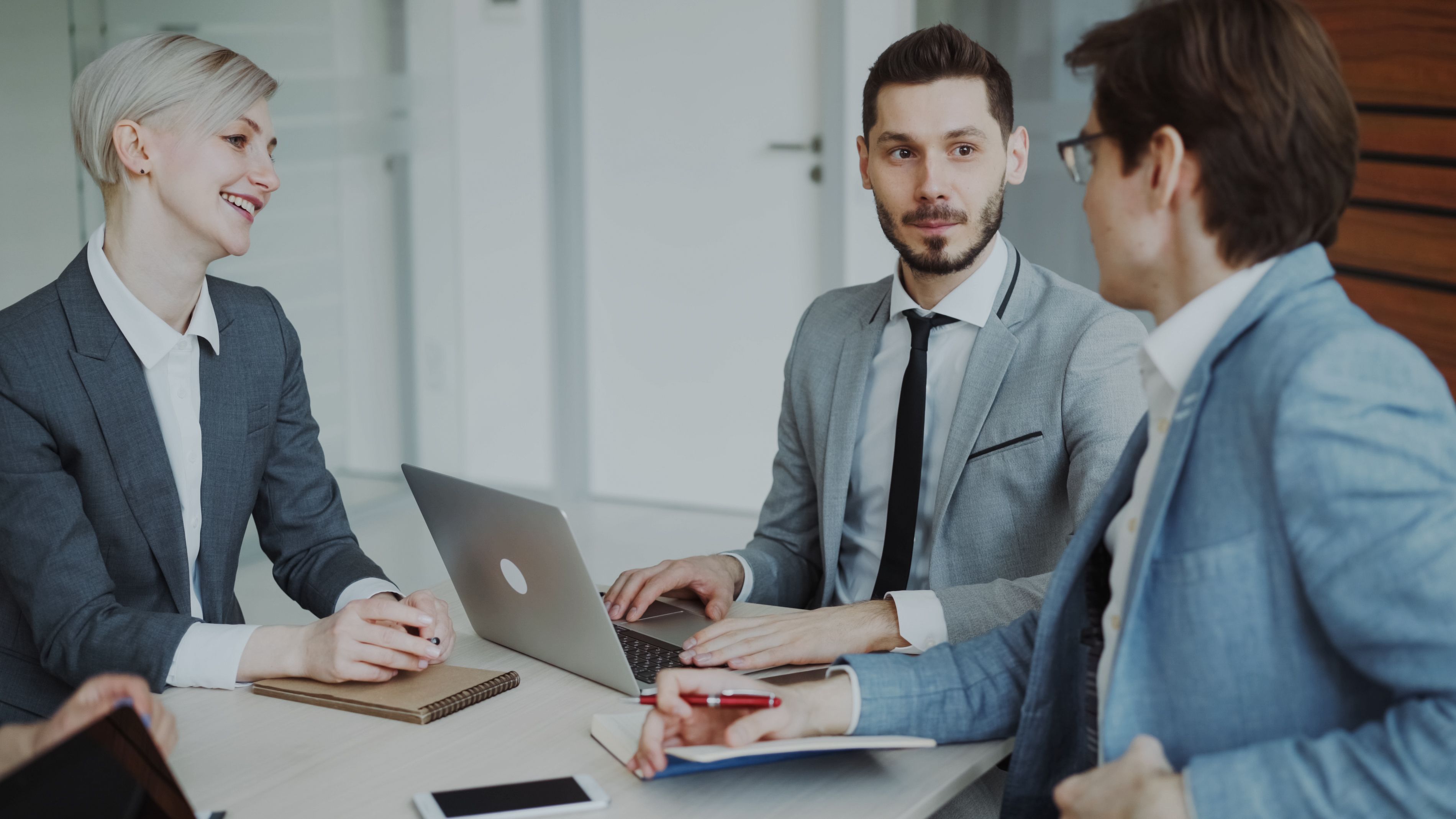 Small business team meeting around a conference table