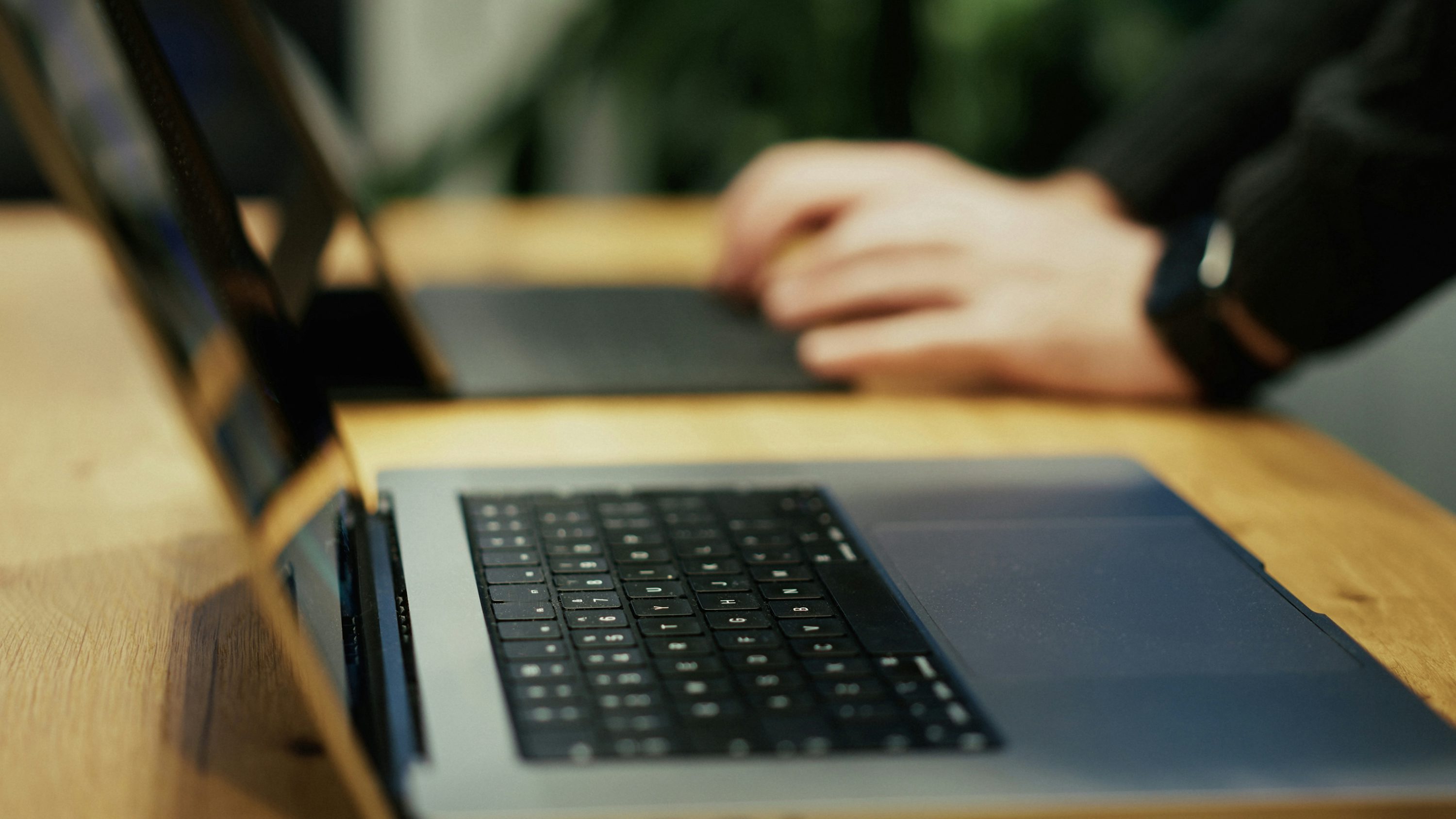 Laptops on a desk in a small business office